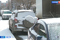 В Красноярске сильный весенний снегопад застал врасплох автомобилистов